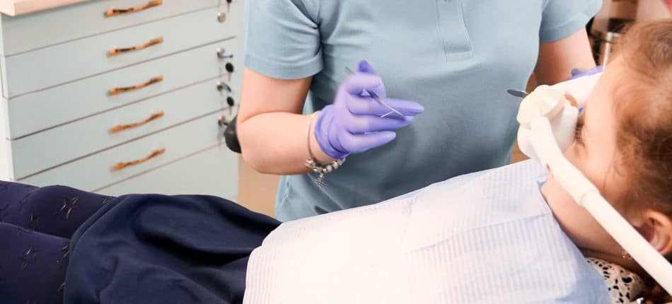 little girl on dental appointment