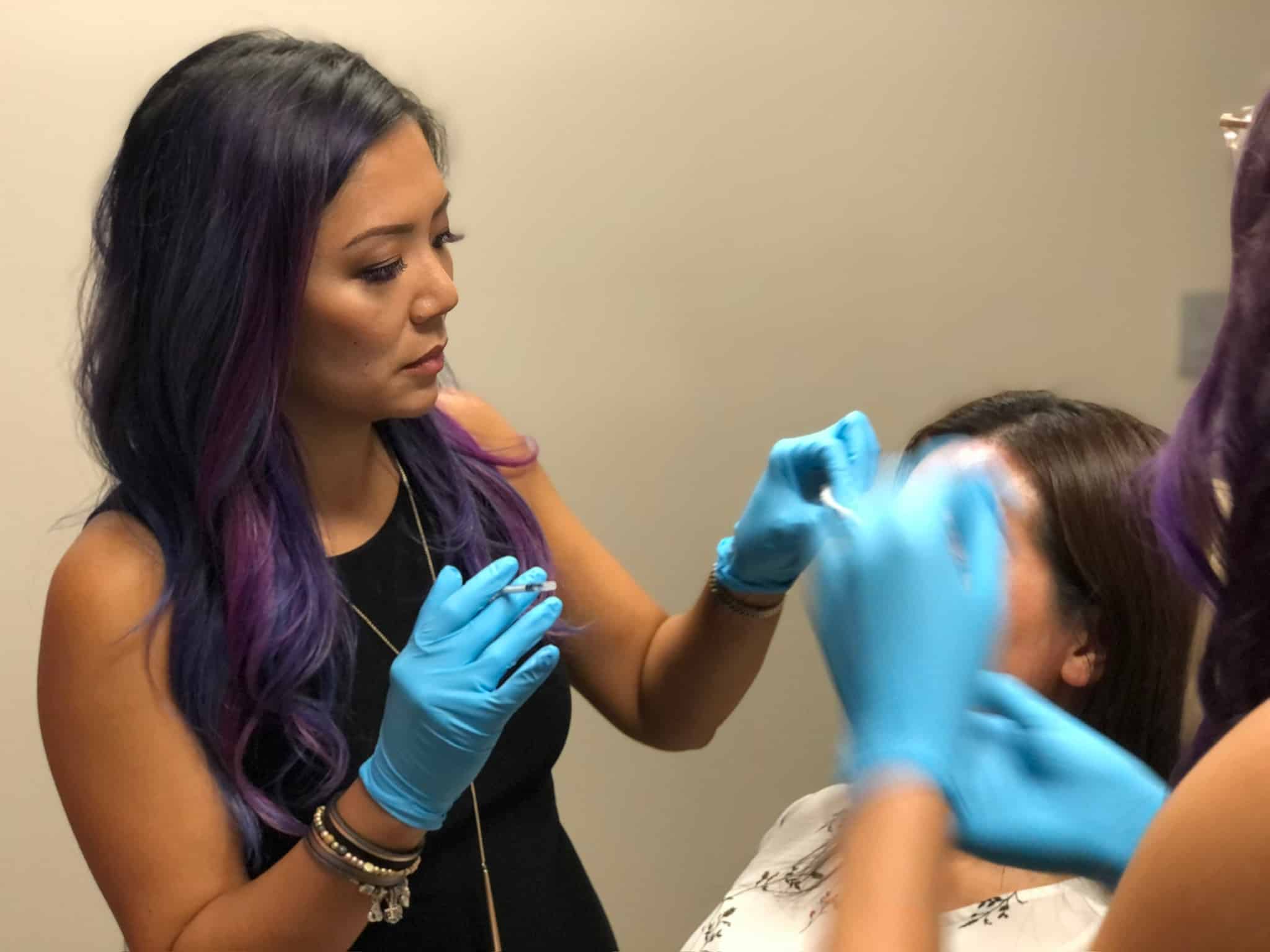 professional performing botox on patient