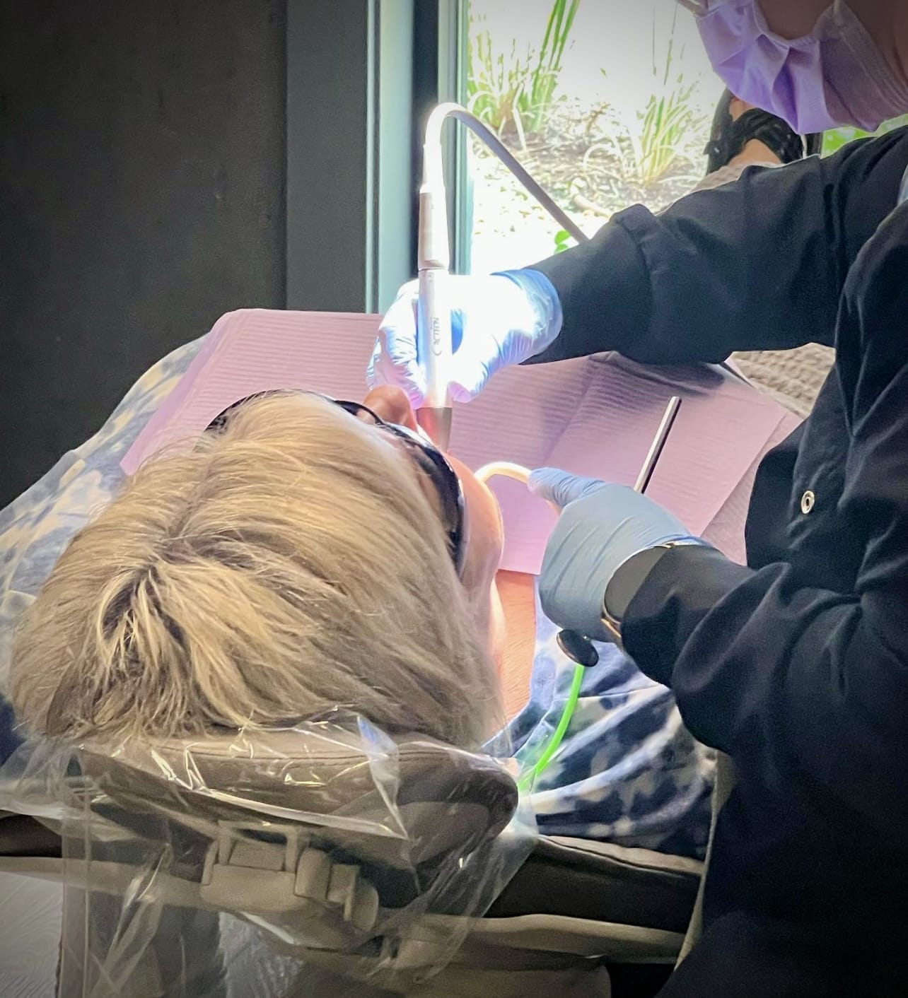 top view of blonde patient dental appointment